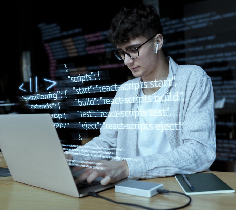 programming-background-with-person-working-with-codes-computer (1)