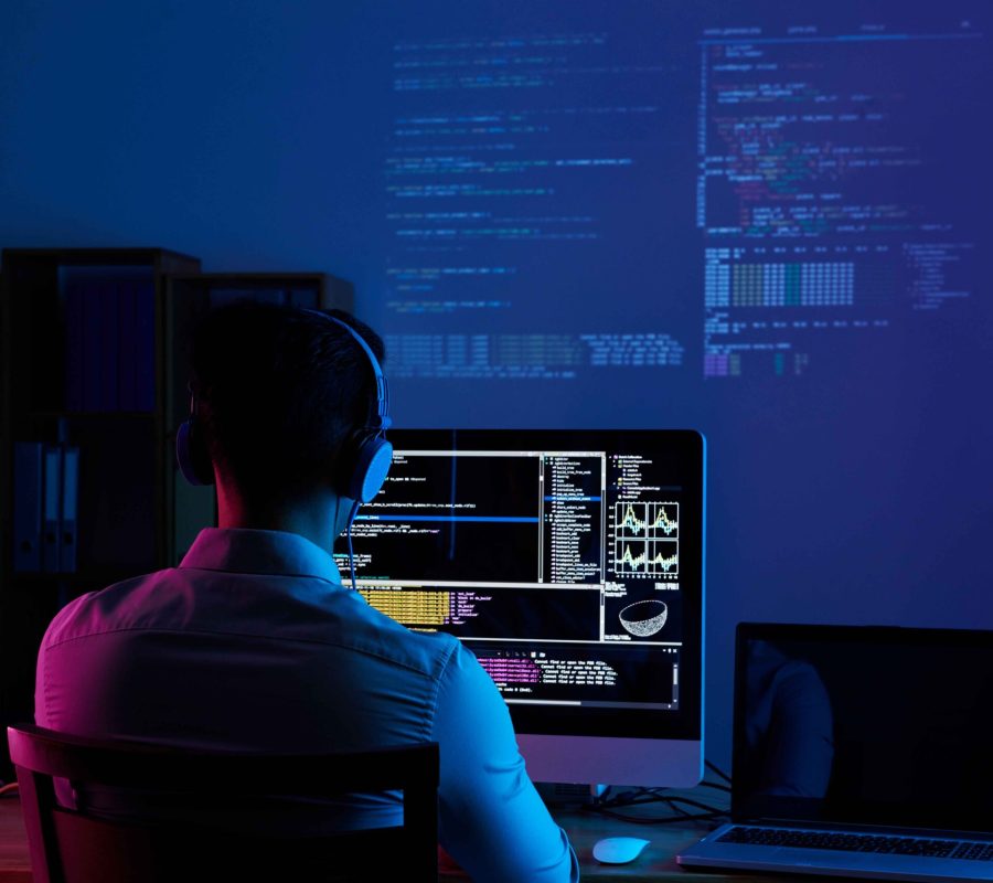 rear-view-programmer-working-all-night-long